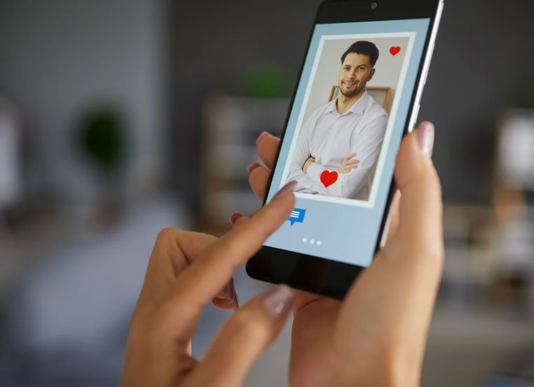 Girl using Dating app on mobile phone